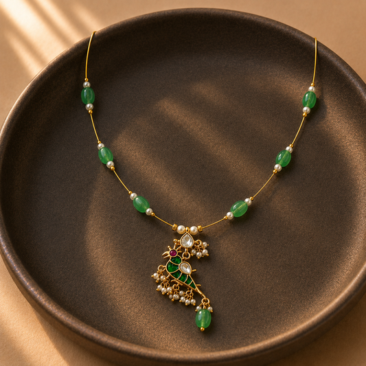 Emerald parrot charm necklace